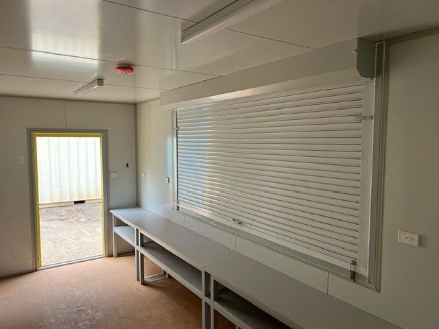 Fitted-out modified container interior